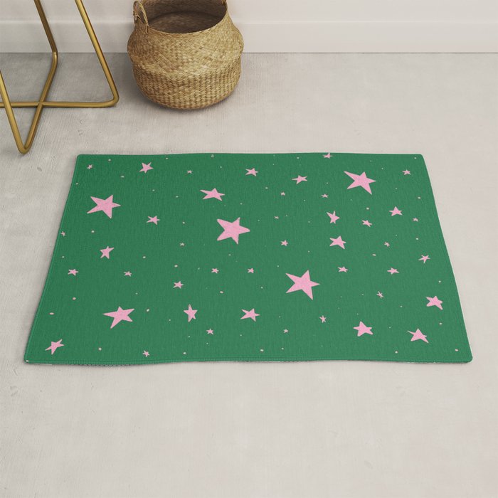 Pink nighttime stars Rug by Thalia Roman Society6