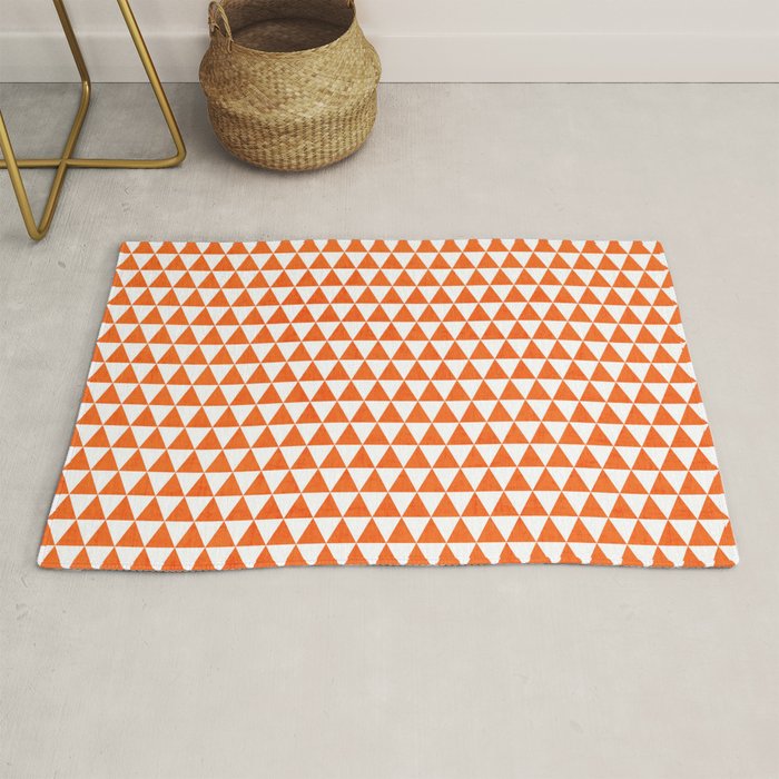 triangles orange and white Rug by her art Society6